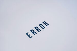 Simple and minimalist image showcasing the word 'ERROR' on a white background.