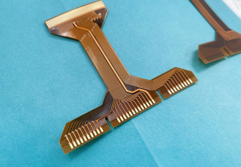 Flexible PCB with thick copper areas illustrating thermal via usage and heat-related reliability challenges